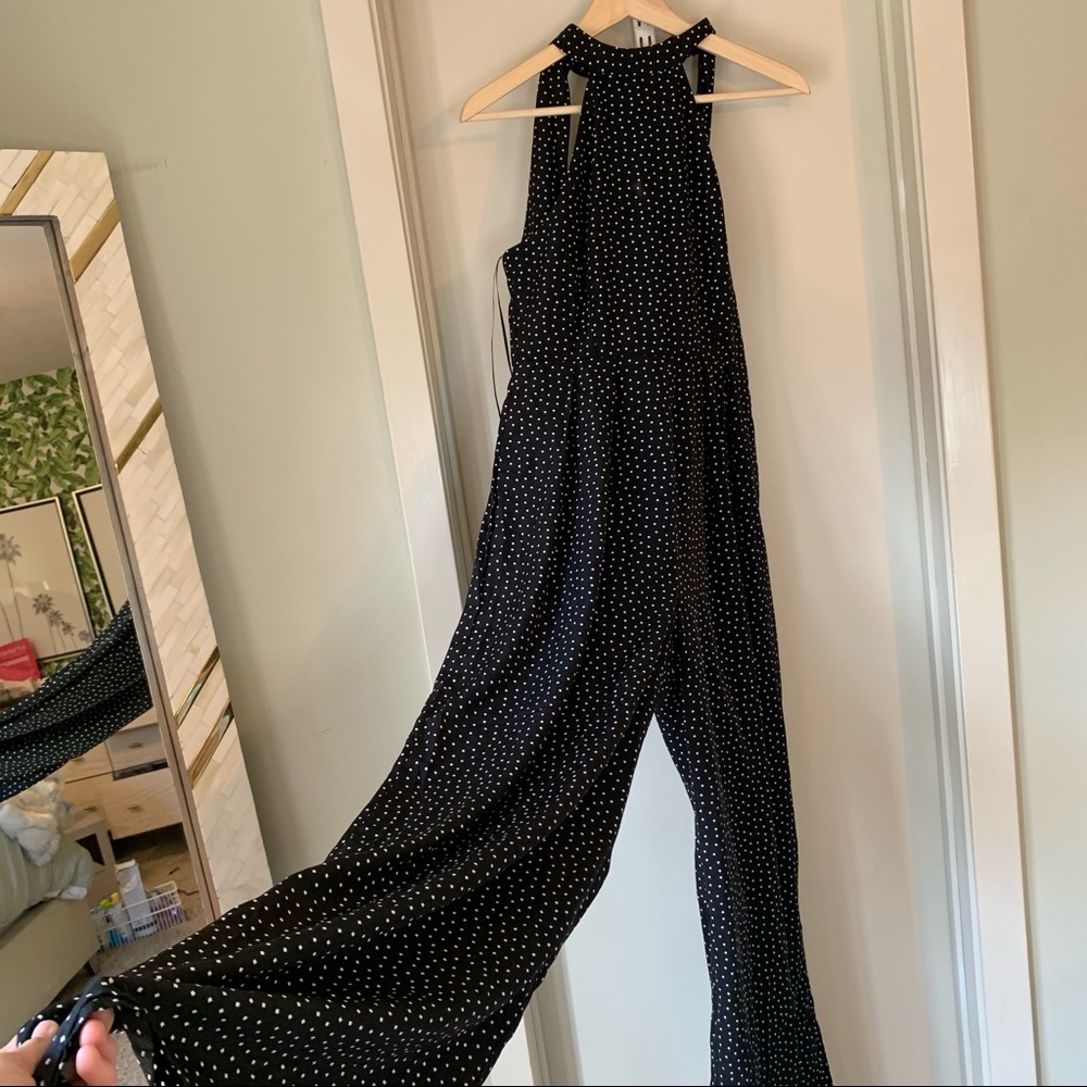 Black jumpsuit with white square dots
